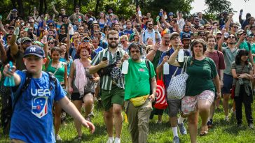people with spray bottles preparing for a silly battle
